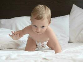 Baby Crawling on The Bed photo