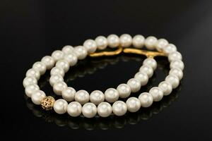 Pearl Necklace on Black Background photo