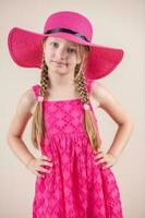 Little Girl With Pink Dress and Hat photo