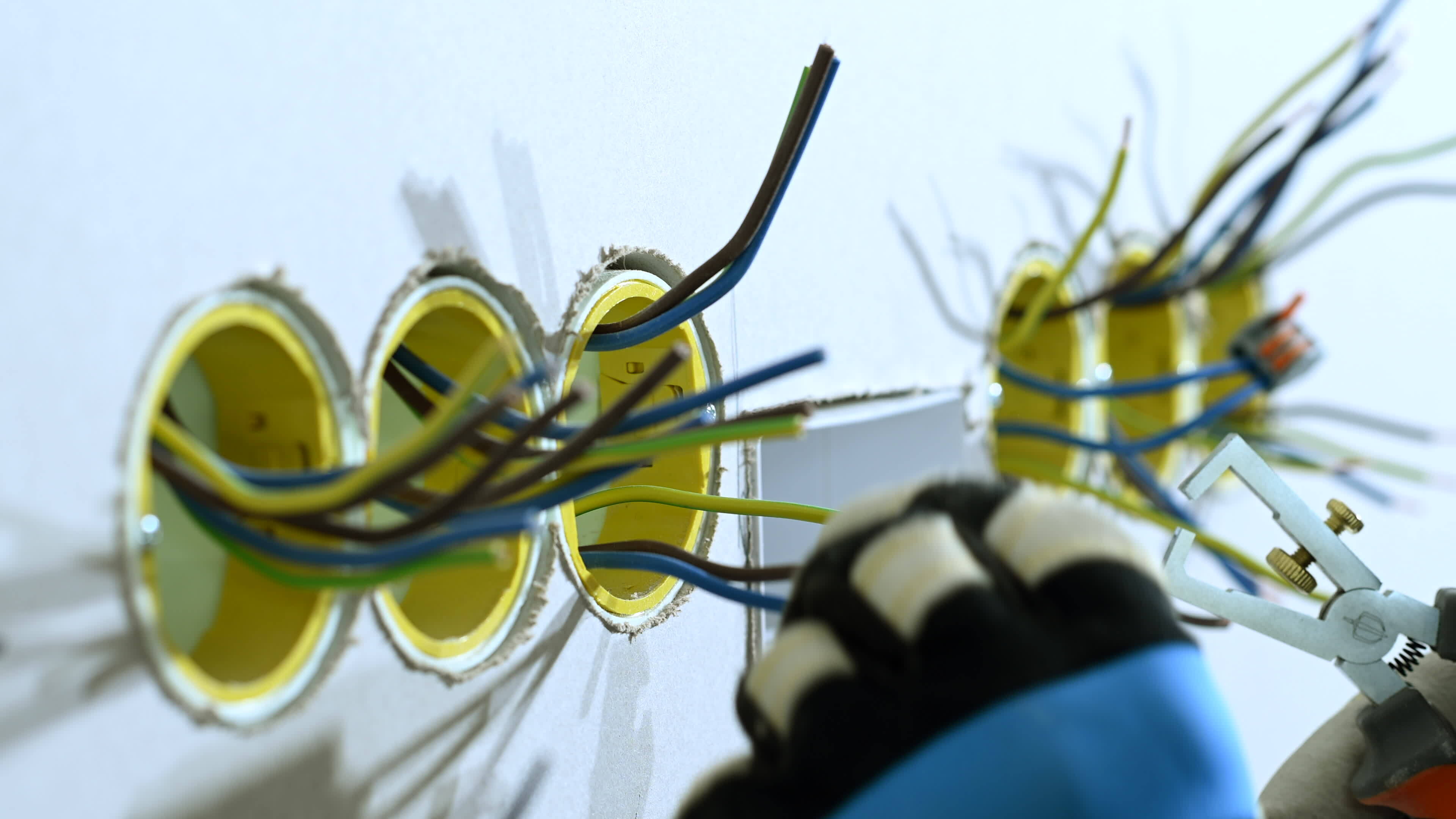 Electrician Getting Ready To Install Multiple Wall Outlets. 24347430