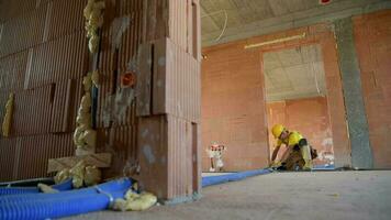 Caucasian Construction Worker Finishing Interior Floor Installation Elements video