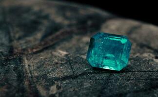 Blue Sapphire Gemstone on Natural Stone photo