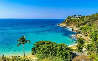 Beach sand blue turquoise water waves panorama Carrizalillo Puerto Escondido. photo