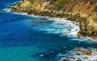 Beach sand blue turquoise water waves panorama Carrizalillo Puerto Escondido. photo