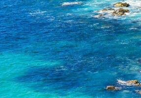 Beach sand blue turquoise water waves panorama Carrizalillo Puerto Escondido. photo
