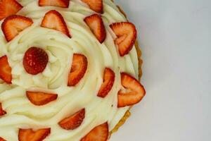 background of colorful cakes with fruit- close up of cakes photo