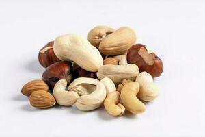 Cashew nuts, almond, hazelnut and blanched peanuts isolated on white background, generate ai photo