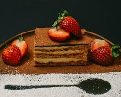 background of colorful cakes with fruit- close up of cakes photo