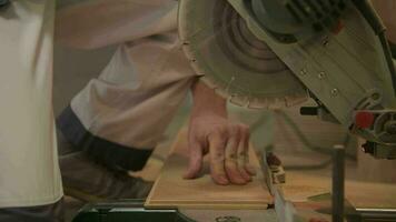 Cutting Wooden Like Floor Panel Using Circular Saw. Construction Equipment and Tools. video