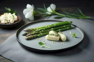 Traditional Bavarian white asparagus served with wild garlic and almond butter close-up on a Nordic design plate with copy space, generate ai photo