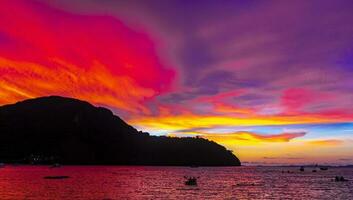 Tropical paradise with stunning sunset beach limestone rocks Krabi Thailand. photo