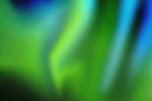 Abstract green and blue multicolor liquify background with grainy texture photo