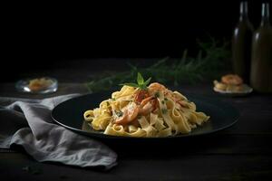 Traditional Italian tagliatelle ai gamberoni pasta with king prawns and herbs served as close-up on a design plate with copy space, generate ai photo