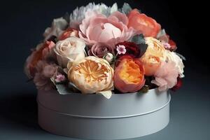 Flowers in round luxury present box. Bouquet of peonies and roses in paper box. Mock-up of hat box of flowers. Interior decoration in in pastel colors. image photo