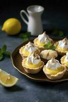 Lemon meringue tarts, one bite desserts idea, generate ai photo