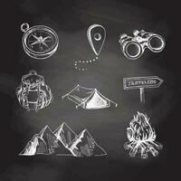 Set of travel icons on chalkboard background. Mountains, campfire, backpack vector