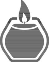 Isolated icon of candle in black and white color. vector