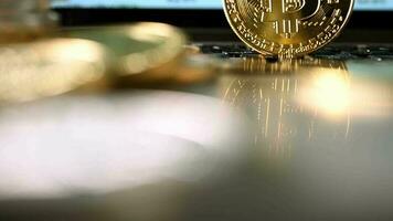 Pan Up Shot Of Digital Currency With Computer Display In Back video
