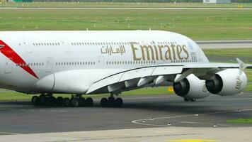 DUSSELDORF, GERMANY JULY 23, 2017 - Emirates Airbus A380 A6 EOB taxiing before departure. Dusseldorf Airport, Germany video