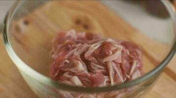 Step-by-step procedures to marinate pork for easy Korean cooking, add chopped onions and Japanese bunching onion, sesame oil, soy sauce, Korean gochujang and mix well. Korean homemade food for lunch video