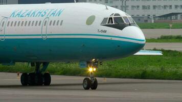 ALMATY, KAZAKHSTAN MAY 4, 2019 - Kazakhstan Kaz Air Trans Tupolev 154 UP T5401 taxiing before departure, Almaty International Airport, Kazakhstan video