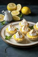 Lemon meringue tarts, one bite desserts idea, generate ai photo