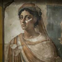 Fresco portrait of woman from Pompei ruins, ancient Rome, Italy, generate ai photo