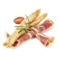 Tasty Italian Grissini with slices of jamon on white background, generate ai photo