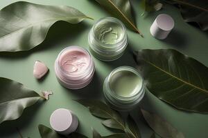 Eco friendly cosmetics decorated with green leaves, organic facial skincare, makeup and skin care cosmetic items. image. photo