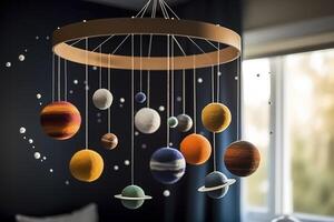 Solar system made of felt, hanging mobile above the baby crib, child toys, science for infants. Baby crib mobile with stars, planets and moon. First baby eco-friendly toys. image. photo
