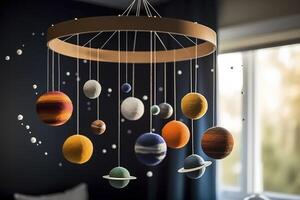 Solar system made of felt, hanging mobile above the baby crib, child toys, science for infants. Baby crib mobile with stars, planets and moon. First baby eco-friendly toys. image. photo