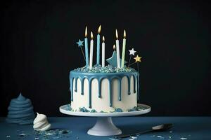 White birthday drip cake with teal ganache, star toppers and fun candles over dark blue background, generate ai photo