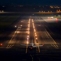 aterrizaje pista en noche luces ai generado foto