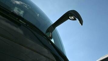 Close Up Of Front Windshield Wipers And Big Mirror Of Coach Tour Bus video