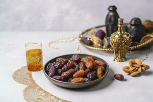 Eid al-Fitr holiday concept with sweet dried dates, fruits and decorations on bright background. Top view from above, generate ai photo