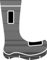 largo bota icono en negro y blanco color. vector