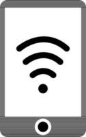 Smartphone glyph icon with wireless connection. vector