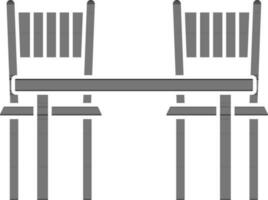 Table With Chairs Icon In Black And White Color. vector