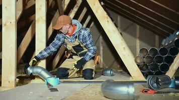 Heating and Cooling Technician Finishing Air Circulation System Inside Newly Constructed House. video