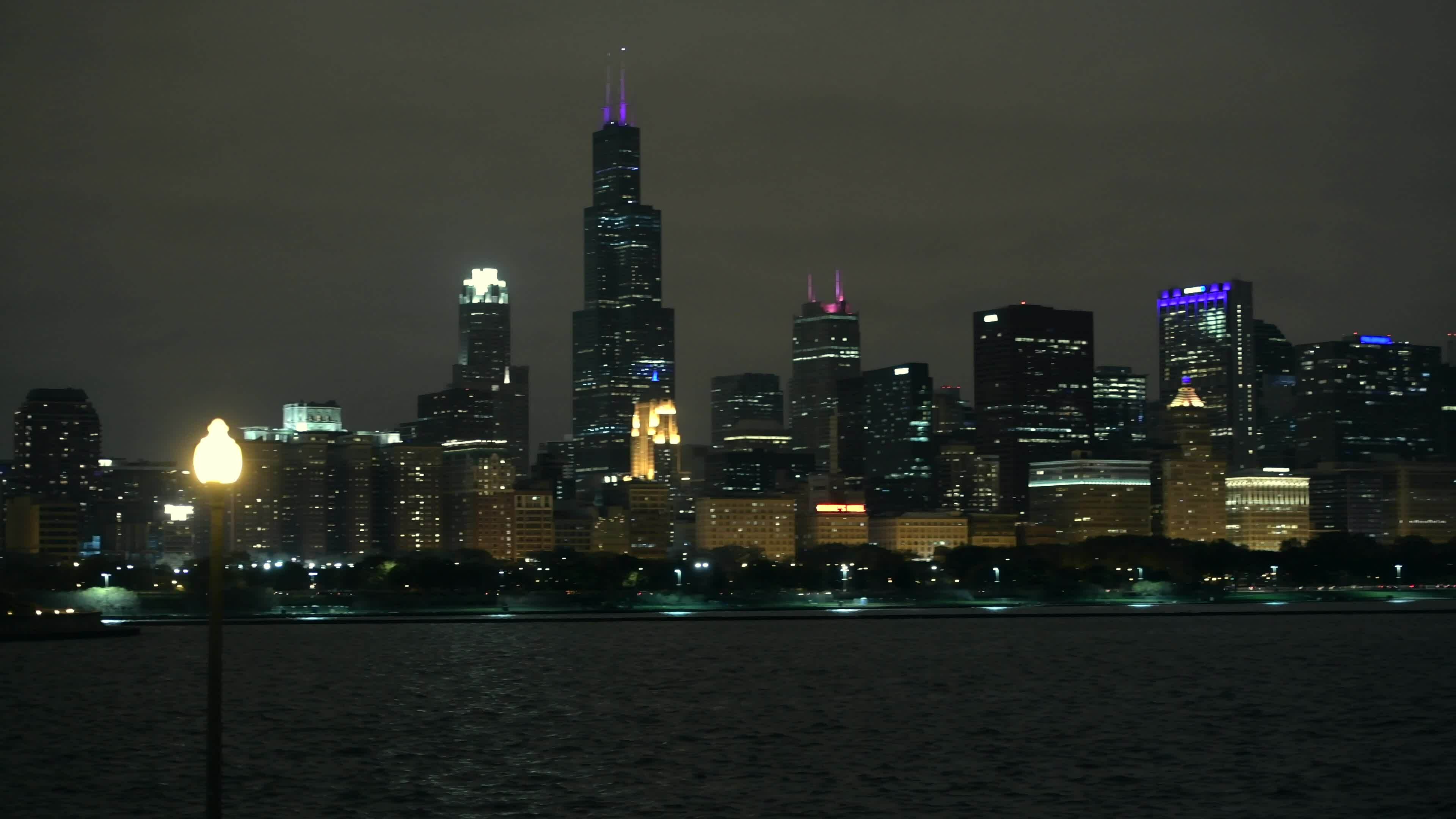 Downtown Chicago at Night. City Panorama with Camera Horizontal