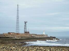 South Gare Lighthouse and Breakwater near Redcar, England photo