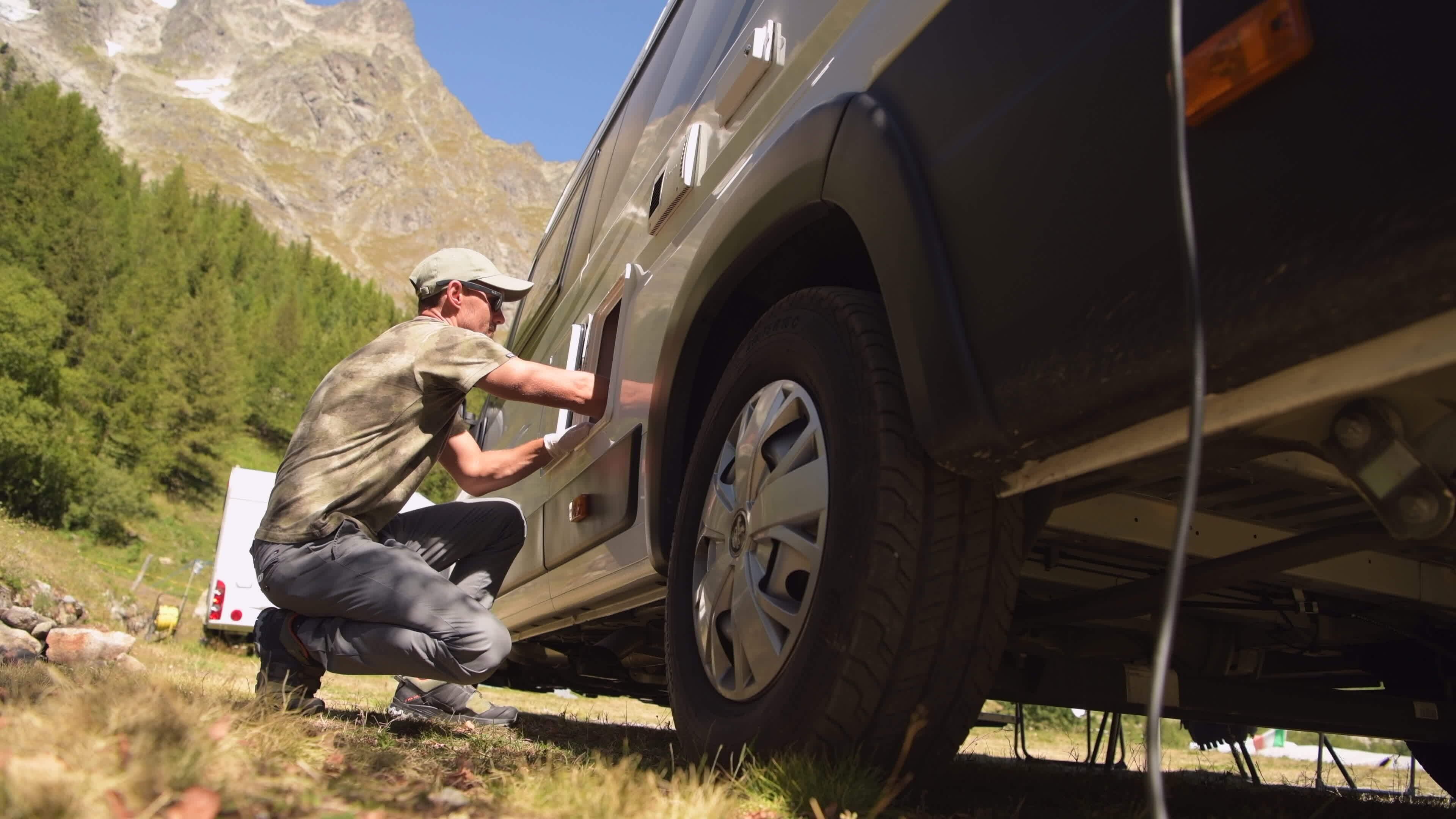 Men Removing Camper Van Cassette Toilet in His Motorhome While on Camping 24480786 Stock Video
