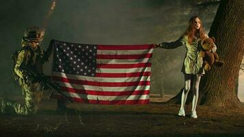 Kneeling Soldier In Full Army Equipment And Young Girl With Teddy Bear video