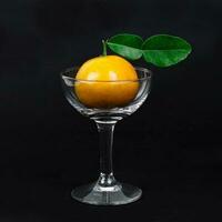 fresh oranges from tropical zone in glass photo