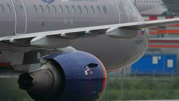 MOSCOW, RUSSIAN FEDERATION JULY 28, 2021 - Airplane of Aeroflot taxiing at Sheremetyevo Airport SVO. Tourism and travel concept. Aircraft closeup video