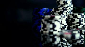 Set Of Multi Color Poker Chips Stack And Full Deck Of Cards On Black Glass Table. video