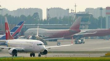 MOSCOW, RUSSIAN FEDERATION JULY 30, 2021 - Boeing 737 of Nordwind Airlines taxiing at Sheremetyevo Airport Moscow SVO. Tourism and travel concept video