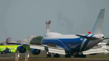 NOVOSIBIRSK, RUSSIAN FEDERATION JUNE 17, 2020 - Cargolux Boeing 747 LX NCL former AirBridgeCargo VQ BUU decelerating and braking after landing at Tolmachevo Airport, Novosibirsk video