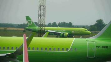 NOVOSIBIRSK, RUSSIAN FEDERATION JULY 24, 2021 - Passenger Airbus A320 of S7 Airlines braking after landing at Tolmachevo Airport, Novosibirsk SVO. Tourism and travel concept. video