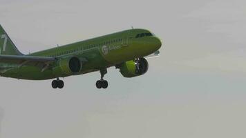 NOVOSIBIRSK, RUSSIAN FEDERATION OCTOBER 20, 2021 - Passenger jet of S7 airlines landing at Tolmachevo airport OVB video